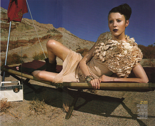Illustration for article titled Marie Claire's "Outlaw" Look: $13,000 Gown & Black Lipstick